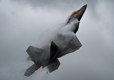 F-22 Raptor in Pull-Push Takeoff Looks Like Prehistoric Beast Hidden in the Mist