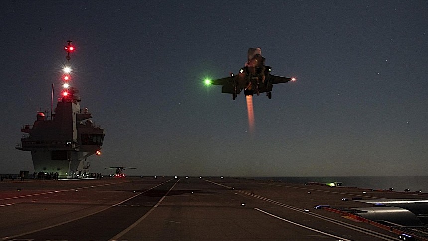 F-35B Lightning II doing a night shipborne rolling vertical landing on the HMS Prince of Wales
