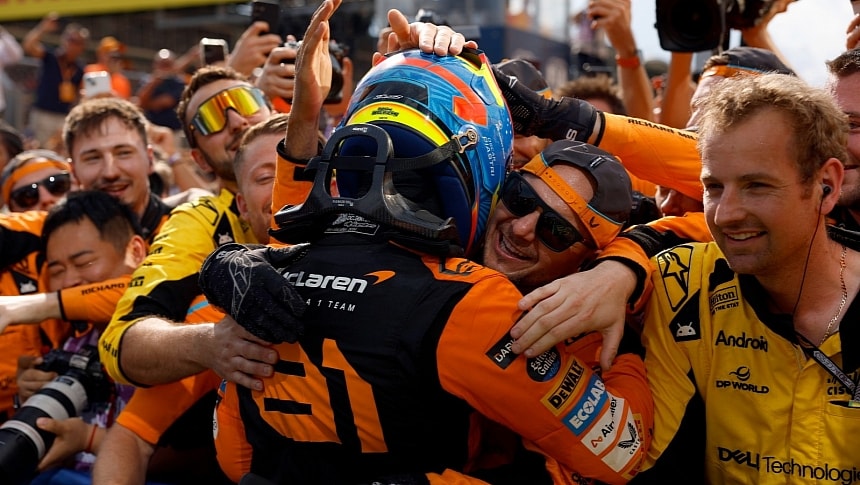 Oscar Piastri celebrates his first Grand Prix win with his team