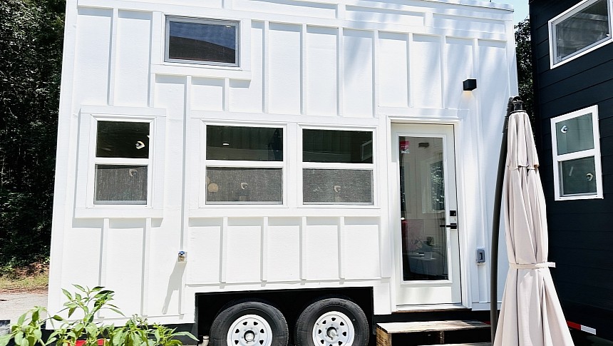 This adorable home on wheels is just 16 feet long but truly beautiful