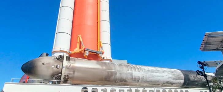 Falcon Heavy booster on its side at the Kennedy Space Center