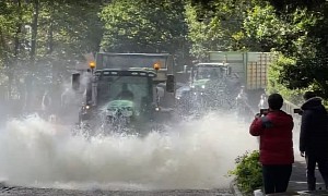 Farmers With Tractors Put On a Show, a Flooded Ford Is No Match for Them
