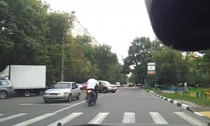 Fast Scooter Crashes into SUV Doing a Weird Turn