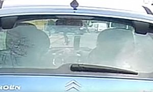 Female Driver Can’t Stop Taking Selfies While Driving Down Busy Road