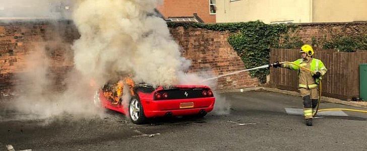 Ferrari F355 Spider burns in a parking lot in the UK