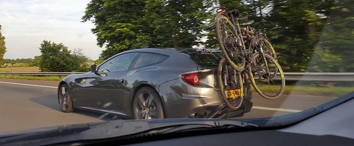 Ferrari FF Hauling a Pair of Bikes on the Highway