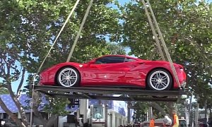 Ferrari’s Entire Lineup Being Lifted by Crane Off a Floating Dock Will Give You the Chills