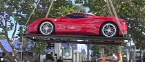 Ferrari’s Entire Lineup Being Lifted by Crane Off a Floating Dock Will Give You the Chills