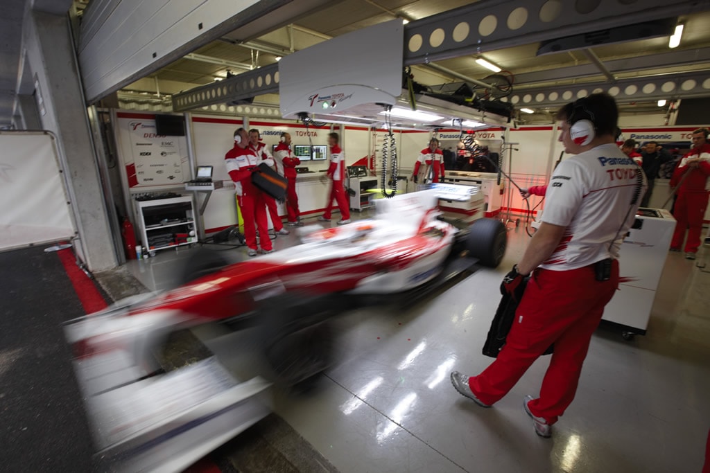 Toyota TF109 exits the Toyota garage during the Portimao testing
