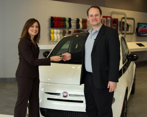 Laura Soave presents Folkerts the keys to his car