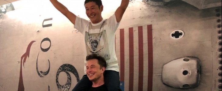 Yusaku Maezawa and Elon Musk after he was chosen as humanity's first space tourist in 2018
