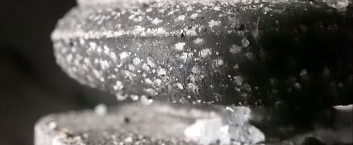 Close-up of salt on suspension components