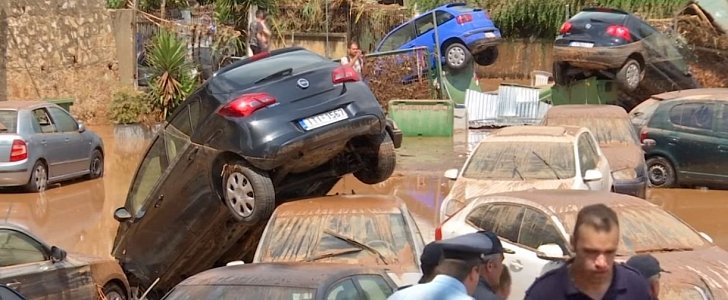 Car park in Maroussi, Greece, turns into lake after flash floods