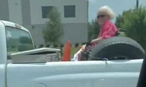 Florida Woman Rides in the Back of a Pickup Truck in Her Wheelchair, Like a Boss