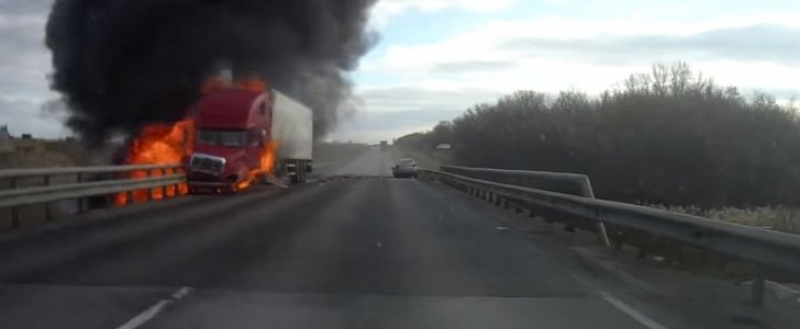 Semi truck bursts into flames after crashing with Ford Focus in Russia