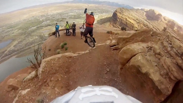 Folks Unicycling Down the Mountains of Moab