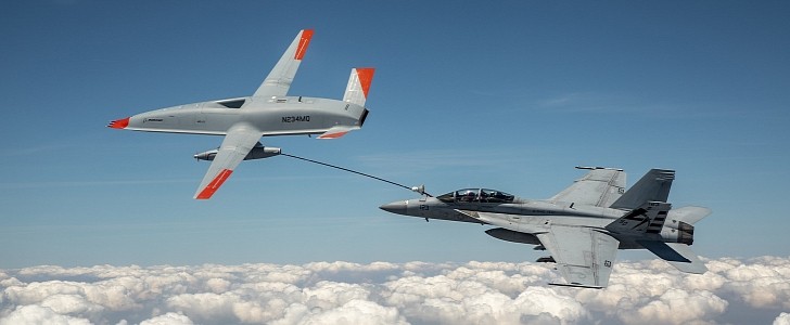 The Boeing MQ-25 T1 test asset transfers fuel to a U.S. Navy F/A-18 Super Hornet on June 4,