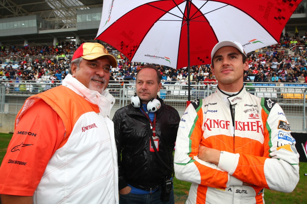 Adrian Sutil and Vijay Mallya on the F1 grid