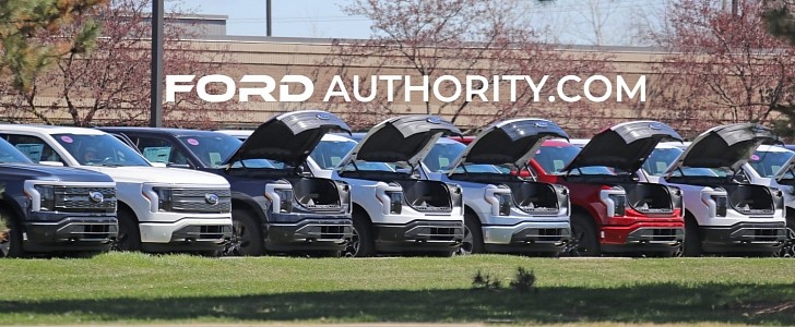Ford F-150 Lightning electric trucks fill up Michigan parking lot, frunks popped open