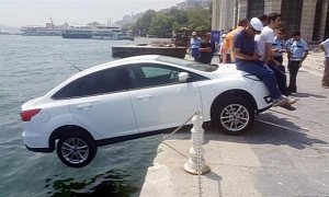 Helpful Locals Save a Ford Focus from Sleeping with the Fishes in Istanbul by Sitting on It