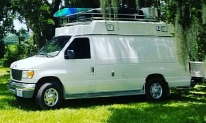 Former Ambulance Now Campervan Is Ready To Travel; It Comes With Its Own Kayak!