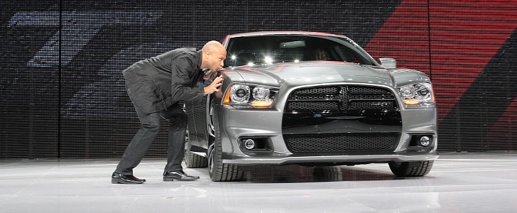 Ralph Gilles unveiling the 2012 Dodge Charger SRT8 at the 2011 Chicago Auto Show