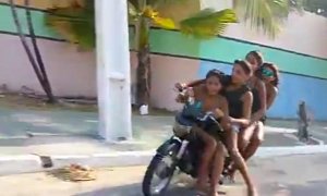Four Kids Riding a Bike Crash in a Most Silly Way
