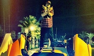 French Montana Sits on The Roof of a McLaren 12C