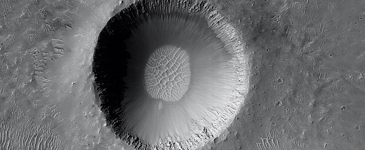 Fresh impact crater in the Meridiani Planum region of Mars