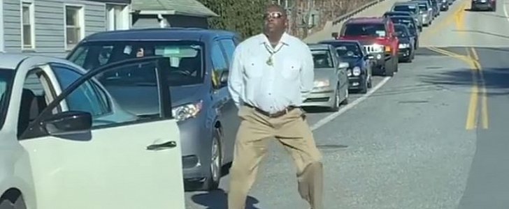 Baltimore driver dances outside his car while stuck in traffic