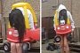 Full-Grown Woman Tries to Fit Into Little Tikes Car, Predictably Gets Stuck