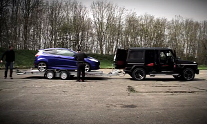 G63 AMG Accelerates While Towing a Fiesta ST