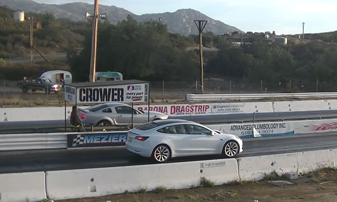 2005 ford mustang gt races tesla model 3 performance and its an absolutely slaughter