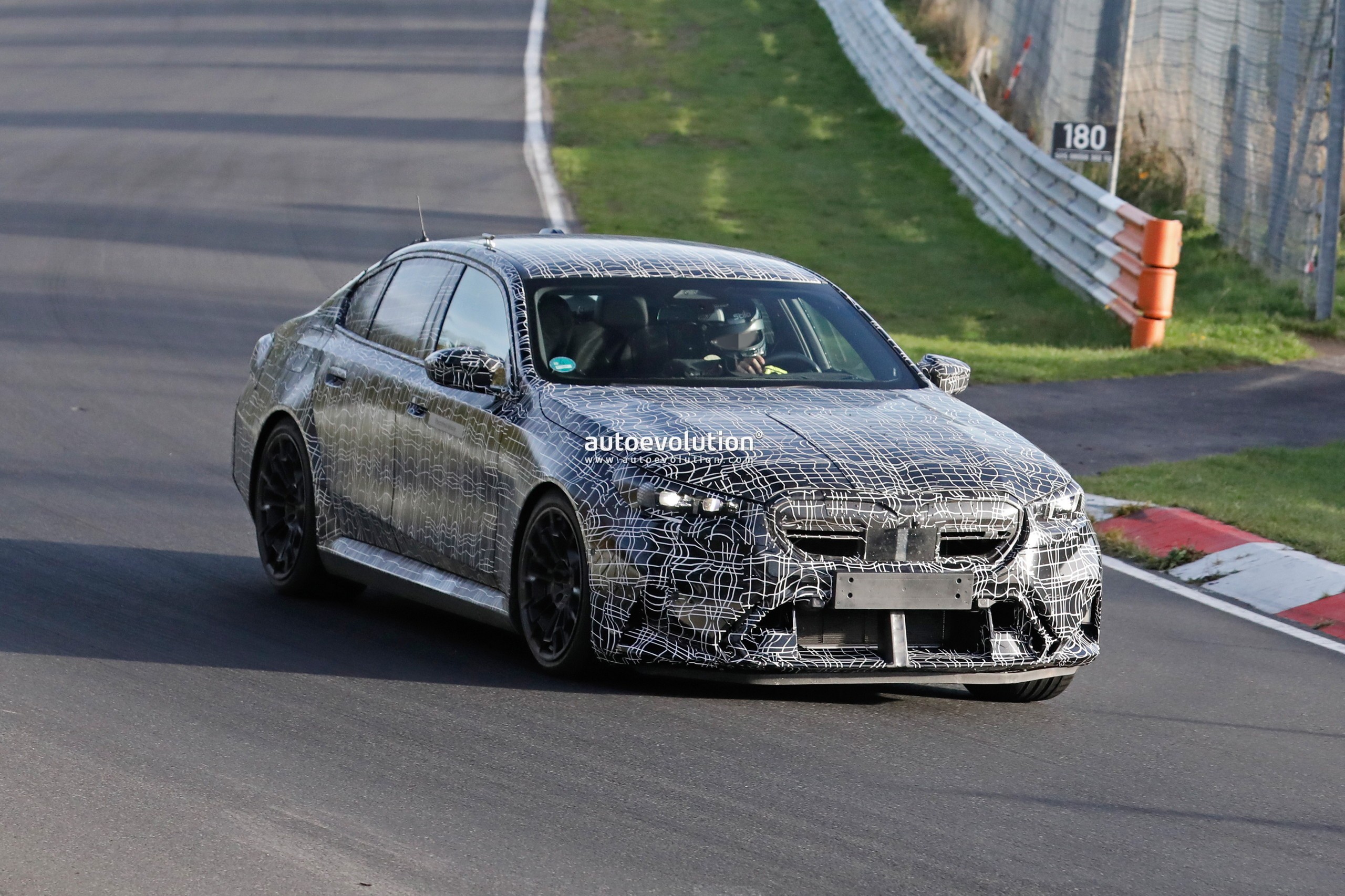 2024 BMW M5 Spied With PlugIn Hybrid Power and Massive Curved Display