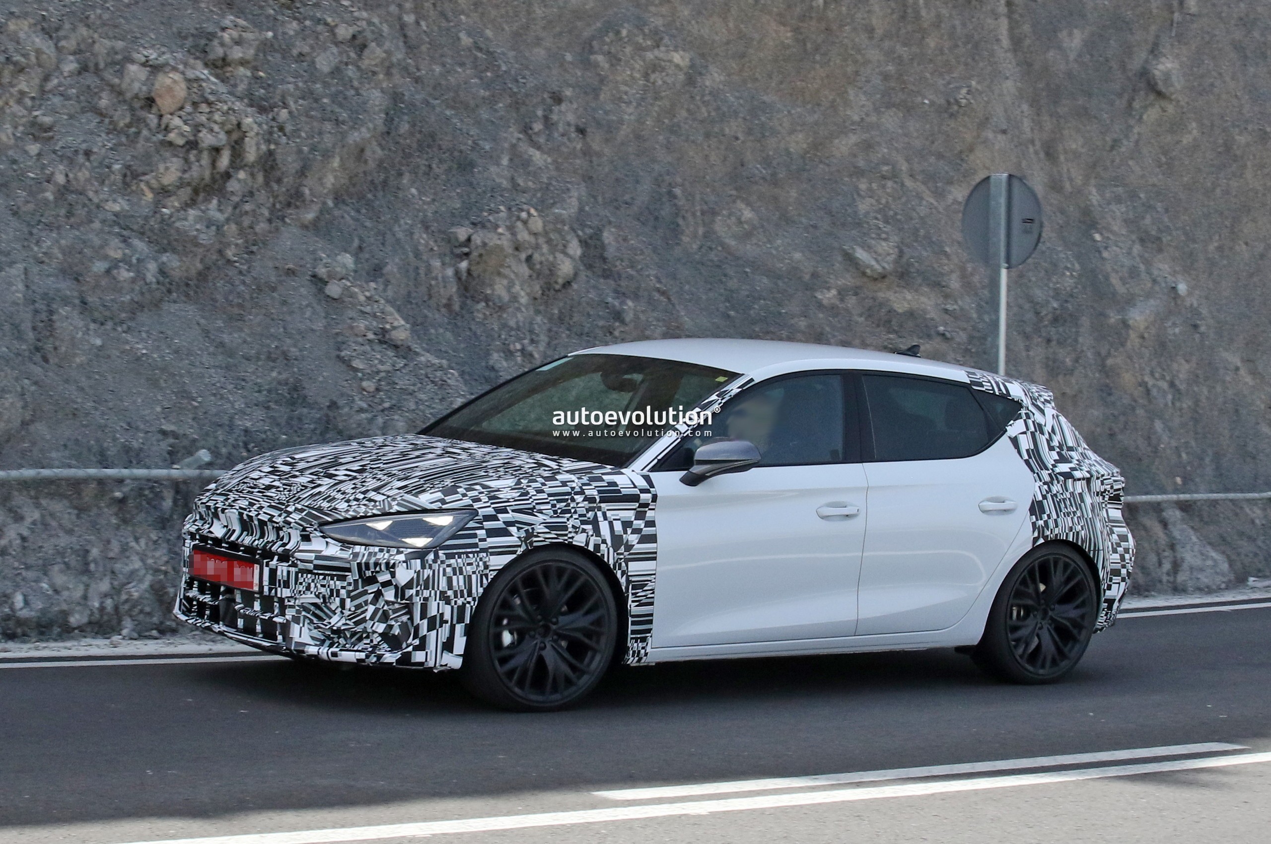 2024 Cupra Leon Spied, Sporty Hatch Shows Tavascan-Inspired Face Beneath  Camouflage - autoevolution