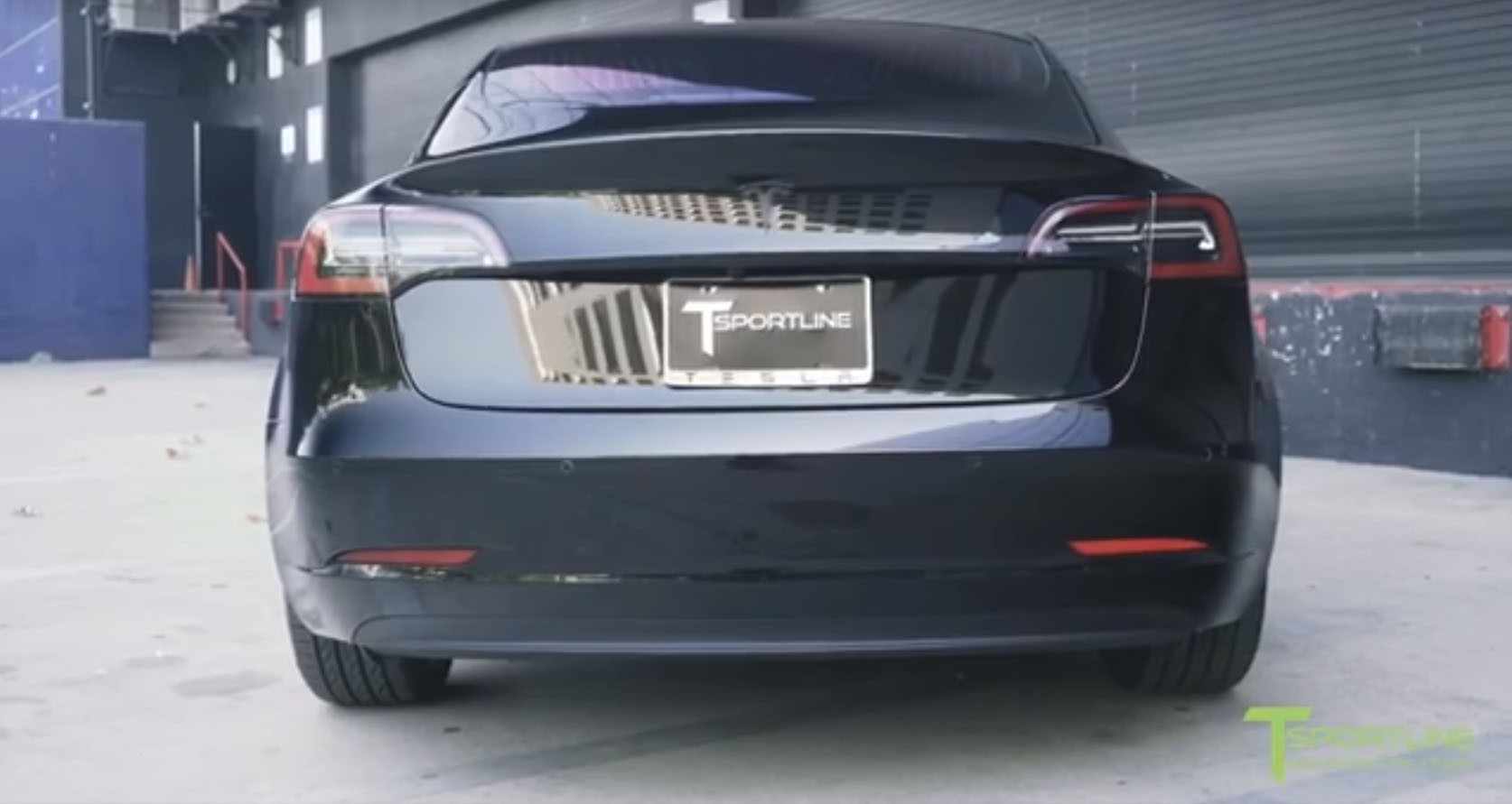 blacked out tesla model 3 looks set to do a drive by shooting