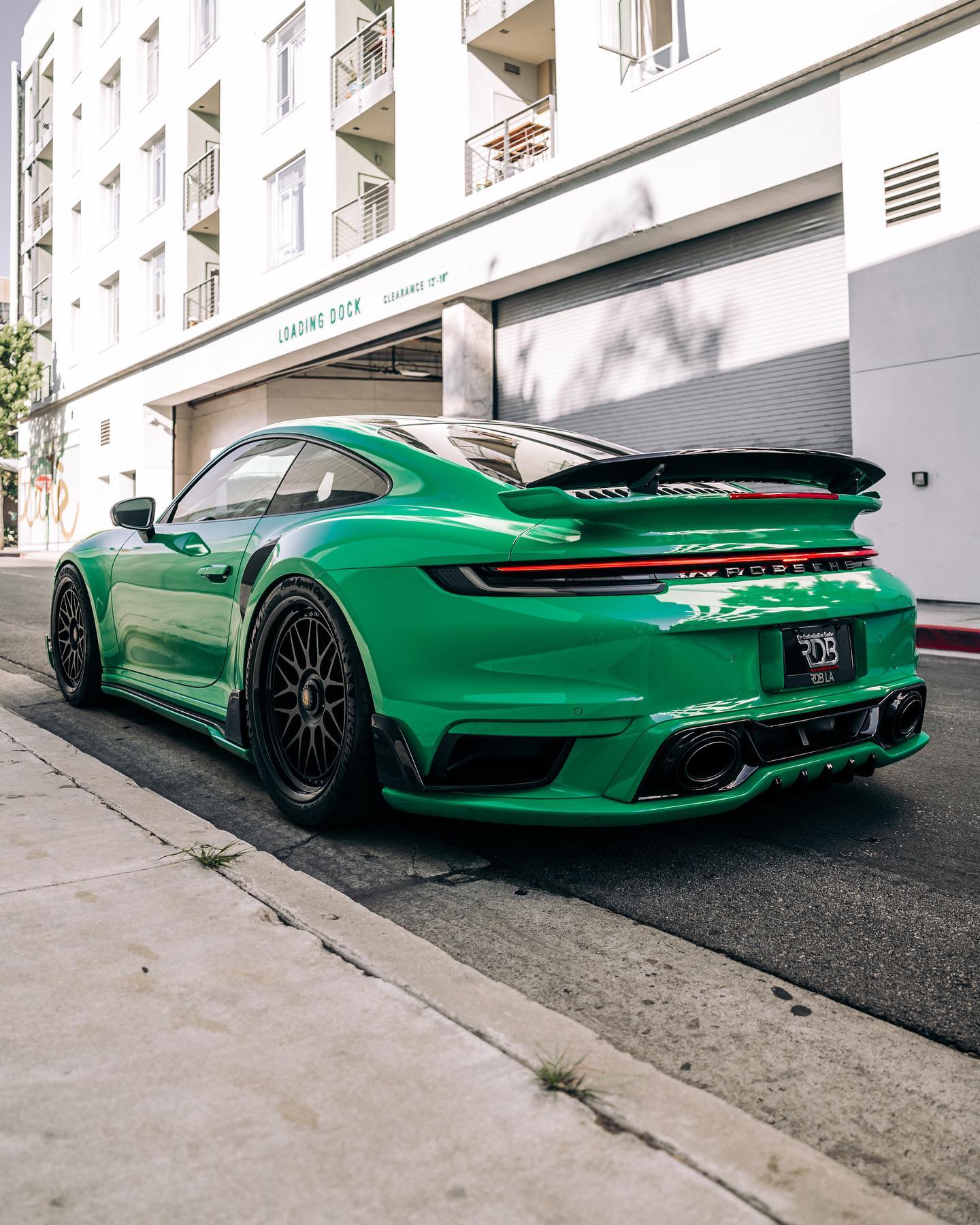 Green Wrapped Porsche 911 Turbo S Has Perfect Two Face Vibes Due To
