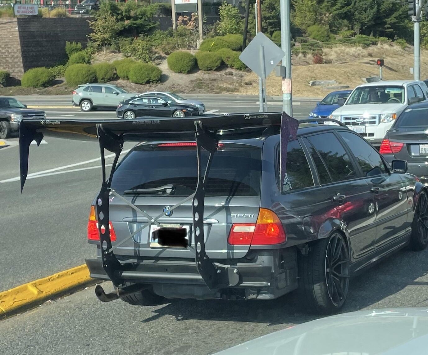 If You Look Closely, You'll See an Old Bimmer Wagon Attached to That Huge  Wing - autoevolution