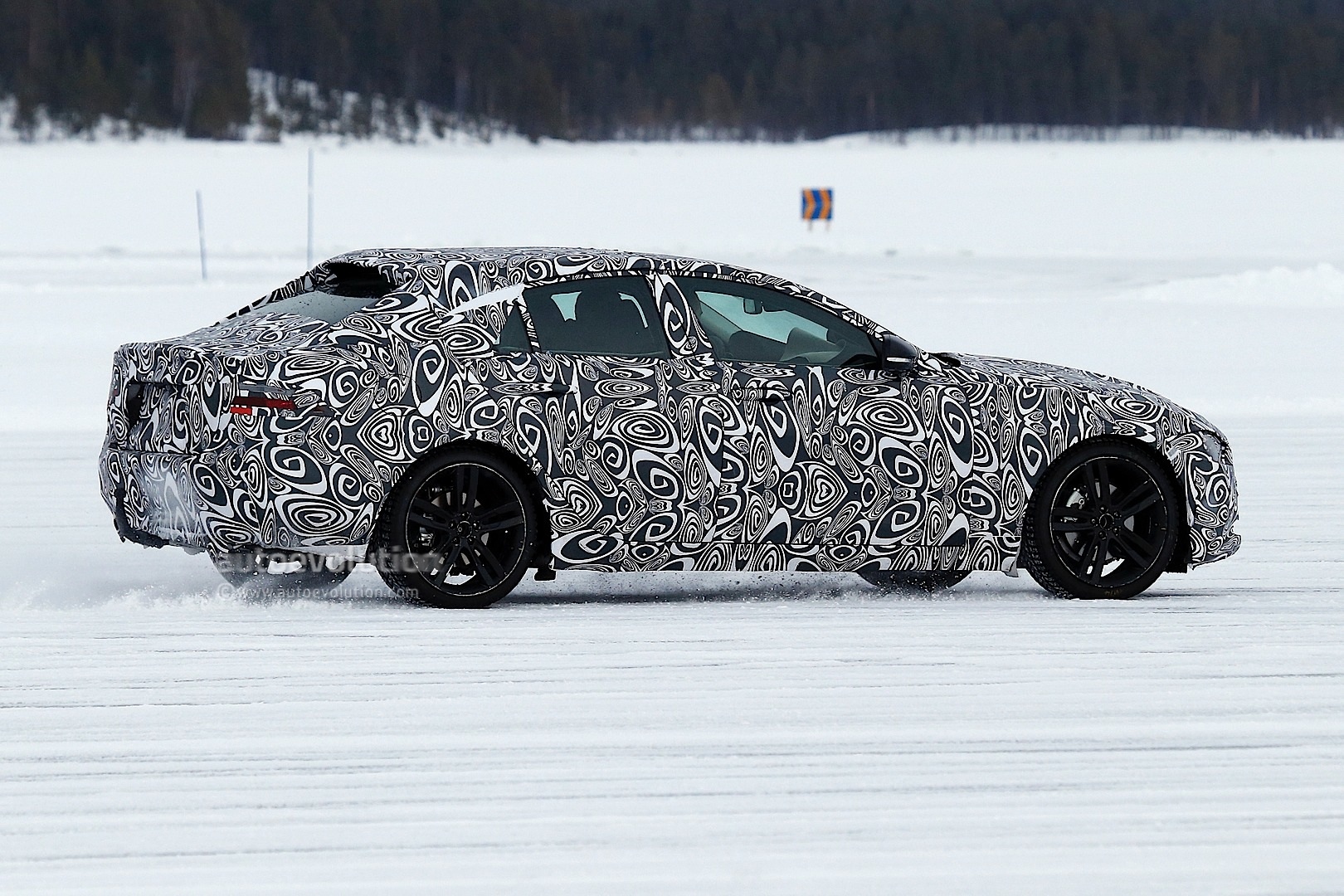 Jaguar XE Prototype Spied Drifting on Ice - autoevolution