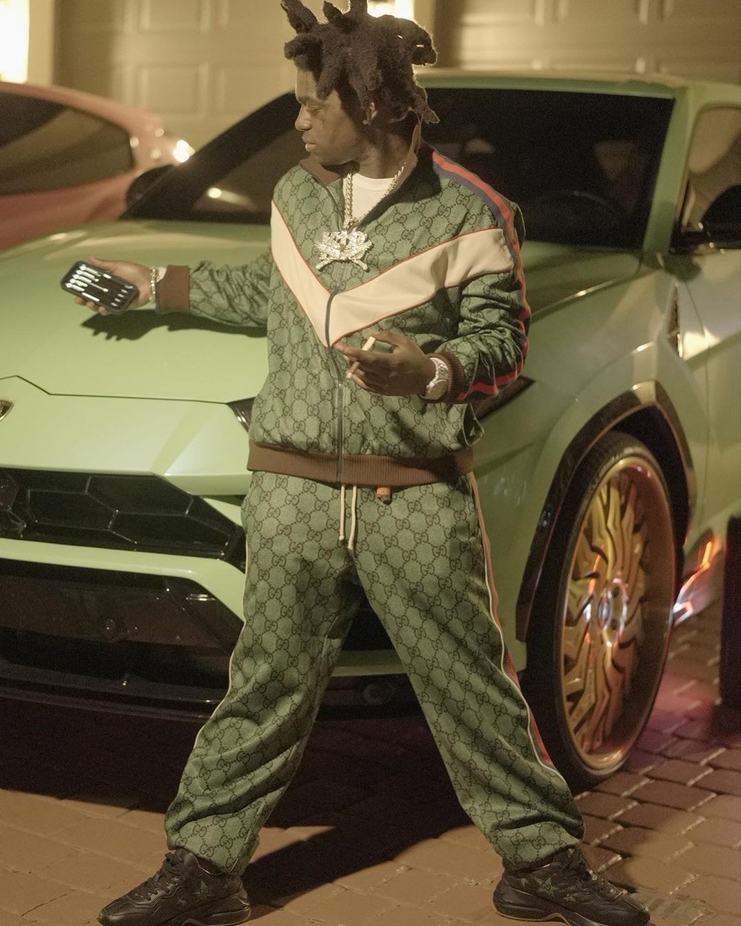 Kodak Black Gets Into the Holiday Season, Matching His Outfit to Green  Lamborghini Urus - autoevolution