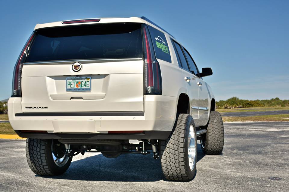 Lifted Cadillac Escalade Wears 22-Inch American Force Nightmare Wheels.