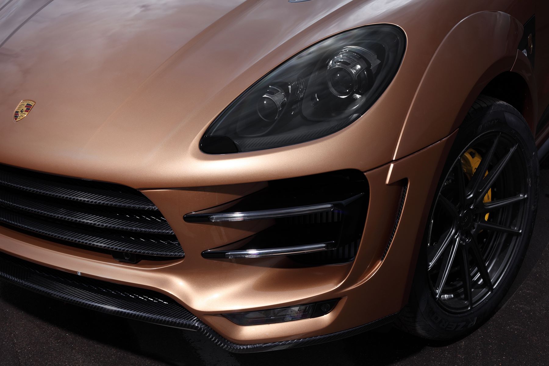 Macan Ursa By Topcar Has Gold Colored Carbon Fiber And Wood