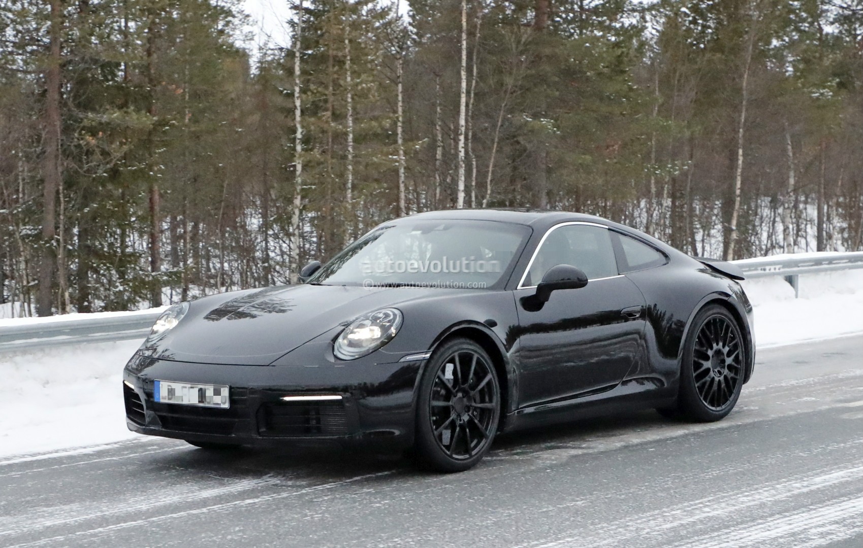 [Imagen: new-porsche-911-spied-with-production-bo...ues_14.jpg]