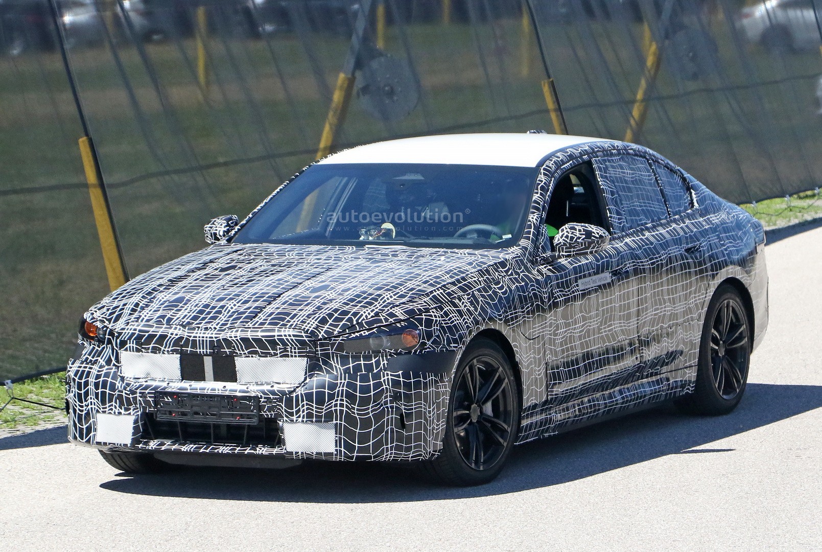 Next-Gen BMW 5 Series PHEV Prototype Keeps Looking Sharp Despite Full
