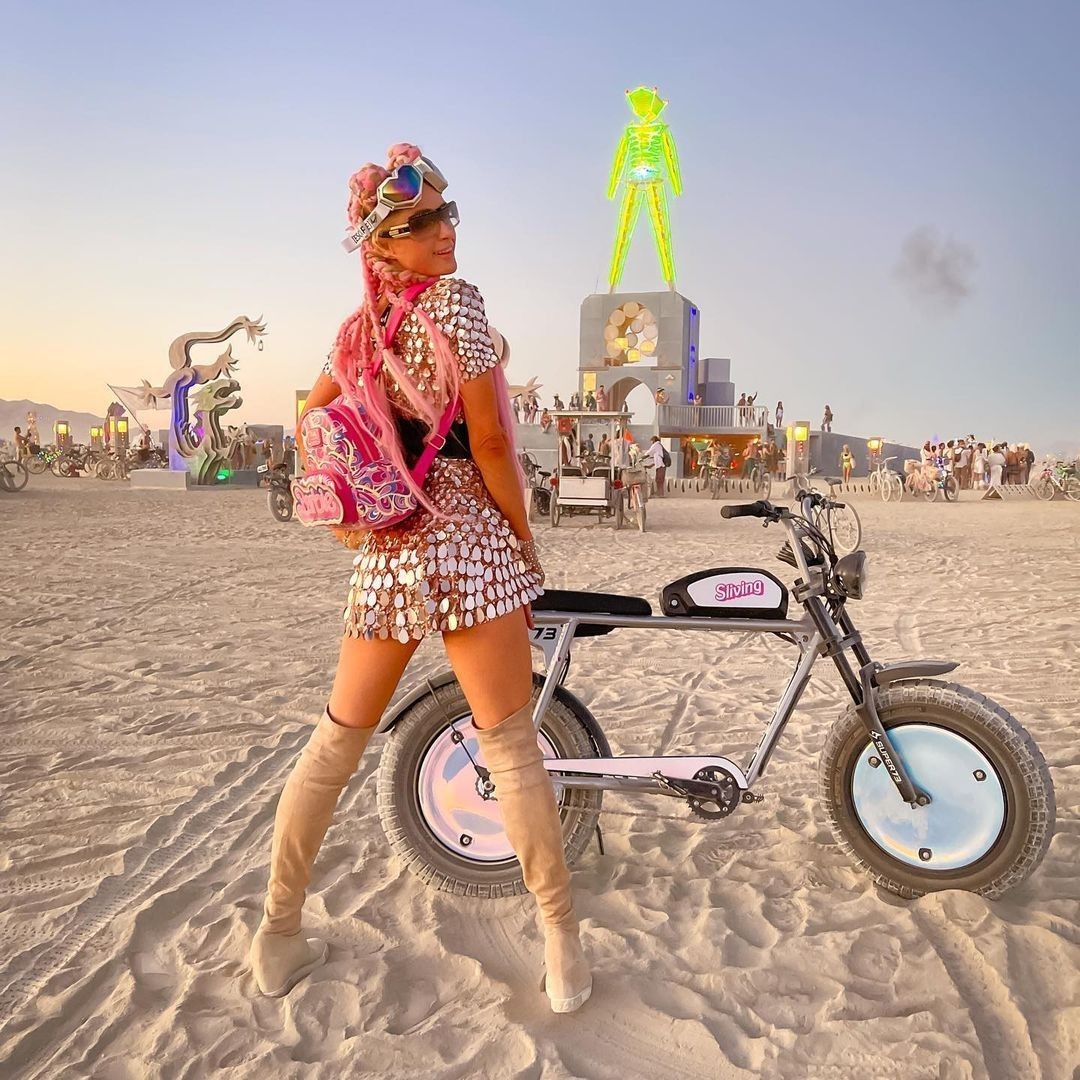 Paris Hilton Attended Burning Man 2022 With a Shiny Outfit and a