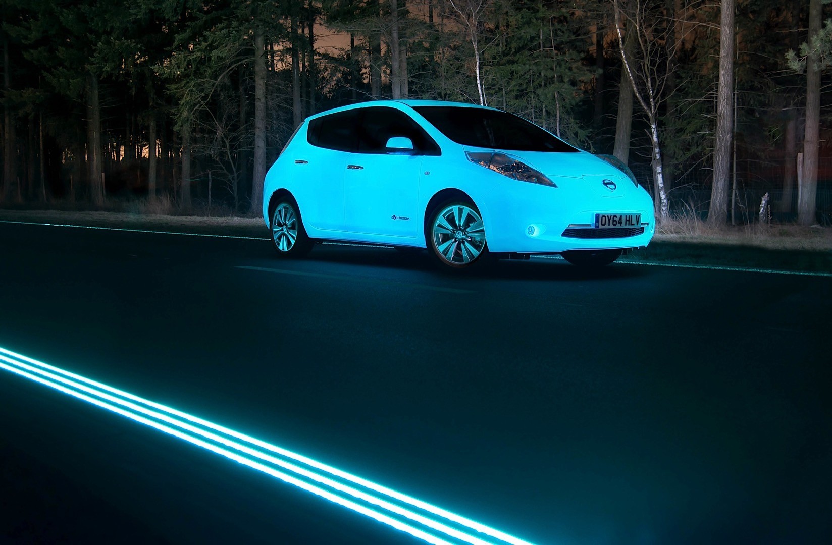 Phosphorescent Nissan Leaf on Glowing Highway Looks Like a Scene From