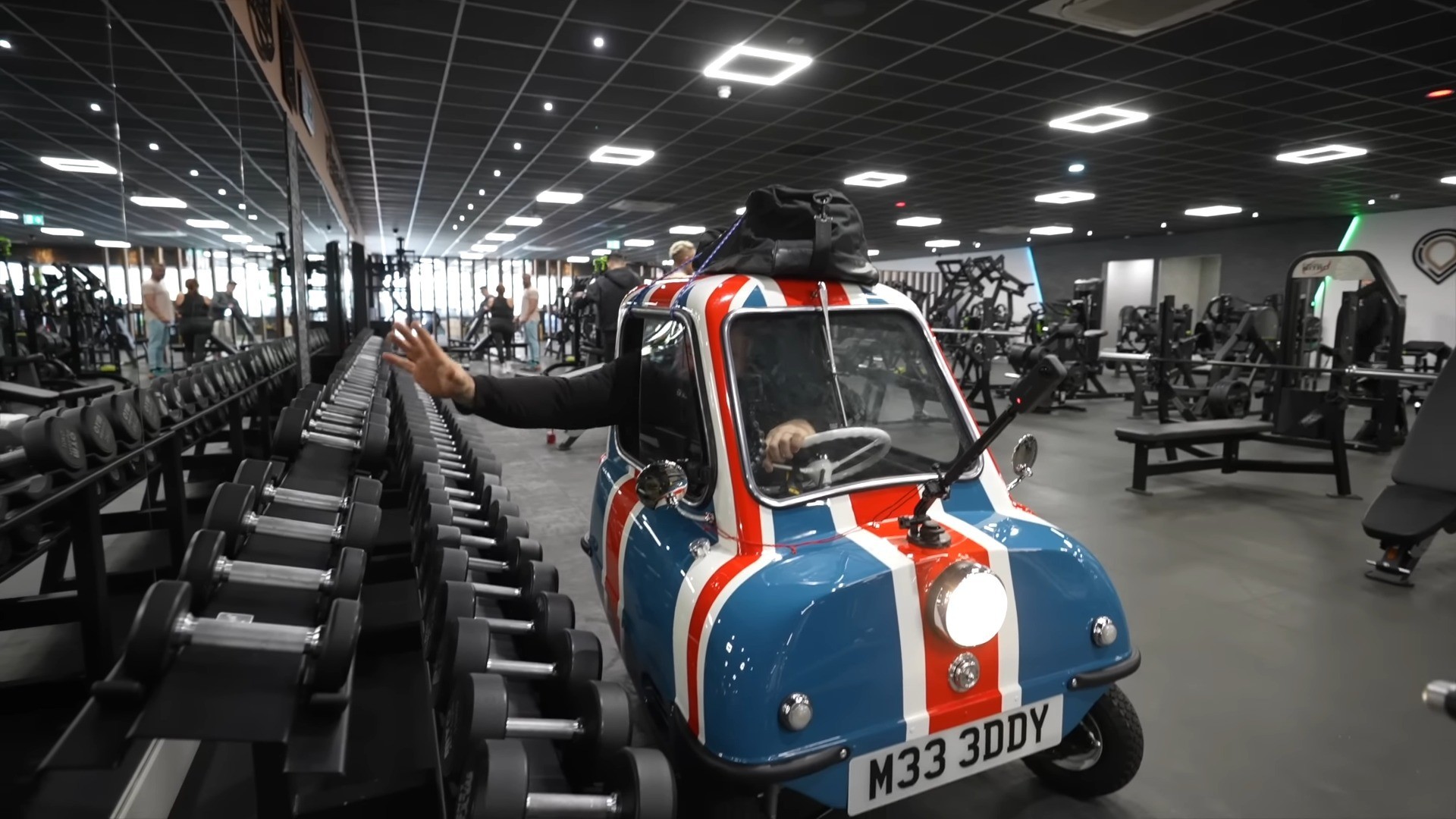 Smallest Car in the World Drives in a Gym; Driver Throws Punches, Pumps  Iron, and Leaves - autoevolution