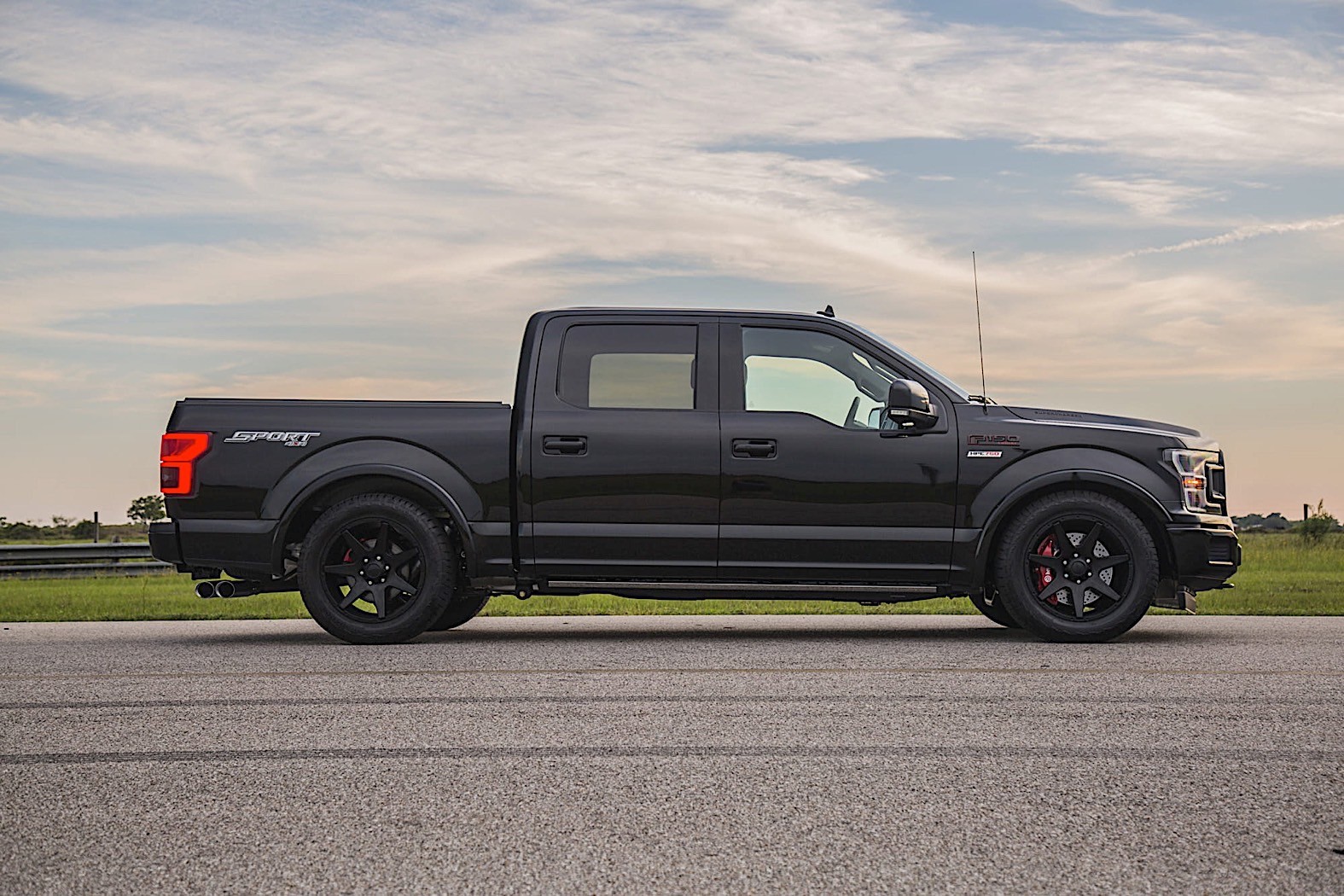 Supercharged Ford F-150 on Lowering Kit Does Some Tasty Donuts.