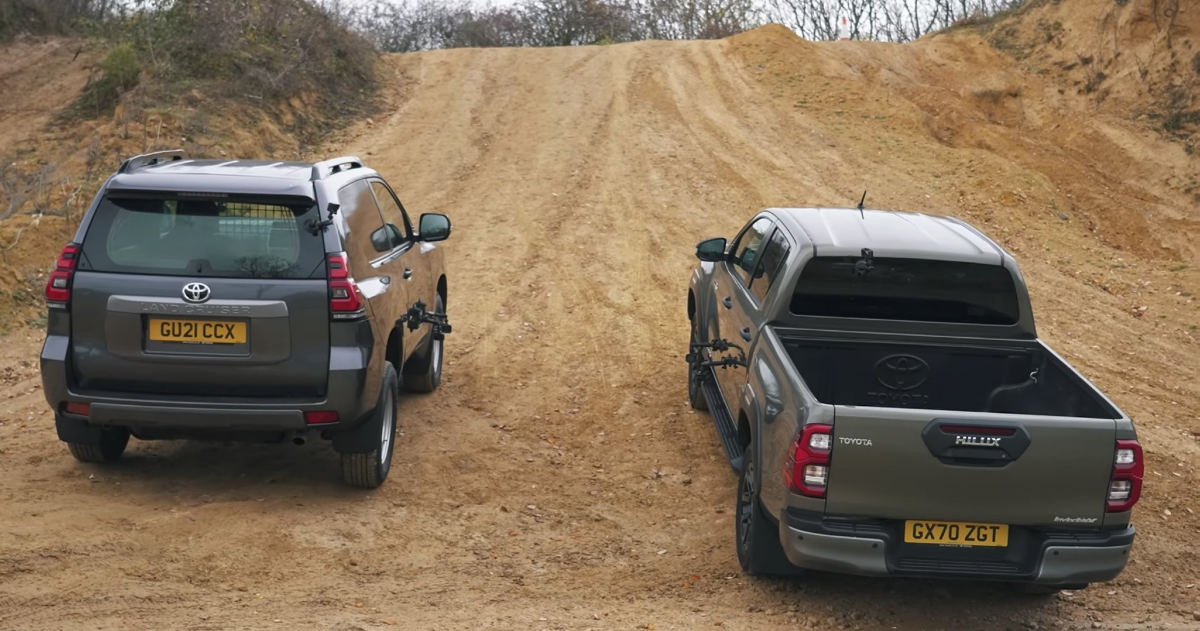 Toyota Hilux Takes On A Land Cruiser In An Uphill Drag Race Gets