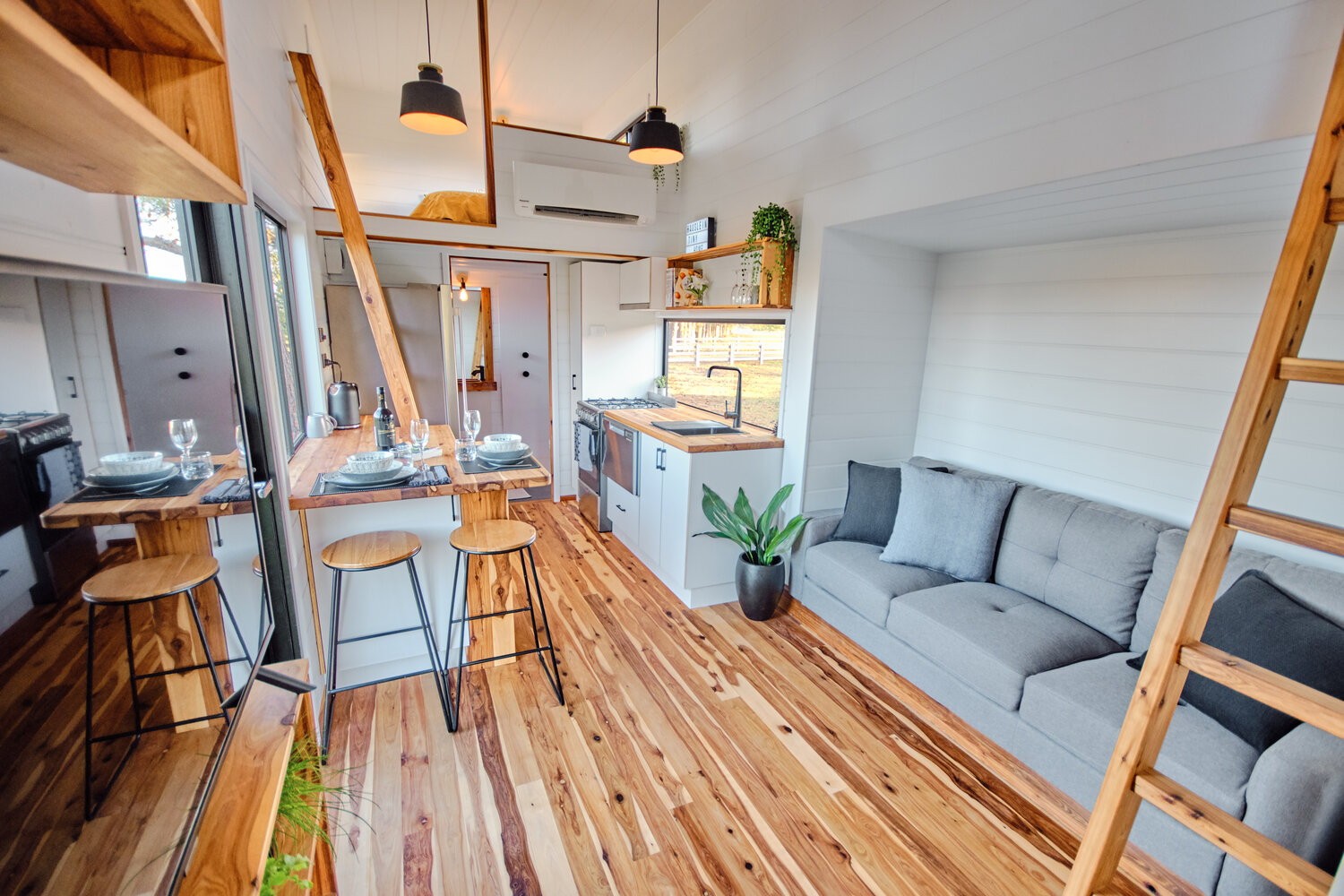 Tiny house gets extra girth for spacious apartment-like interior